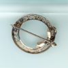 Picture of Art Deco Era 14K White Gold Filigree, Diamond & Sapphire Wreath & Bow Brooch
