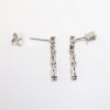 Picture of 18k White Gold Diamond Baguette Illusion Dangle Earrings