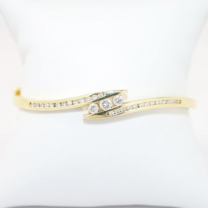 Picture of 14K Yellow Gold & 1.00ct Diamond Channel Set By-Pass Bangle Bracelet with 2 Safety Clasps