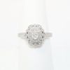 Picture of 14k White Gold, Oval Brilliant Cut & Diamond Cluster Accented Engagement Ring