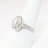 Picture of 14k White Gold, Oval Brilliant Cut & Diamond Cluster Accented Engagement Ring