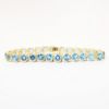 Picture of Blue Topaz Tennis Bracelet, 14k Yellow Gold