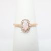 Picture of 14k Rose Gold, Opal and Diamond Halo Ring
