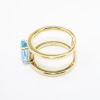 Picture of 14k Yellow Gold & Emerald Cut Blue Topaz Ring with Split Shank