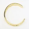 Picture of 'Atlas' Roman Numeral Cuff Bracelet by Tiffany & Co. in 18k Yellow Gold