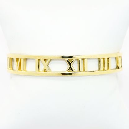 Picture of 'Atlas' Roman Numeral Cuff Bracelet by Tiffany & Co. in 18k Yellow Gold