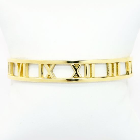 Picture of 'Atlas' Roman Numeral Cuff Bracelet by Tiffany & Co. in 18k Yellow Gold
