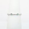 Picture of 10k White Gold Petite Diamond Band Ring with Emeralds