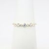 Picture of 14k Yellow Gold & Graduated 0.20ct Diamond Band Ring