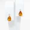 Picture of 14k Yellow Gold & Pear Cut Citrine Stud Earrings with Diamond Accents