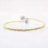 Picture of 14k Two-Tone Gold, Sapphire and Diamond Flexible Bypass Bracelet