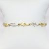 Picture of 10k Two-Tone Textured Gold Dolphin Link Bracelet