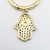 Picture of 14k Yellow Gold Hoop Earrings with Pavé Set Diamond Hamsa Charms