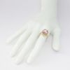 Picture of 14k Yellow Gold & Oval Cut Pink Tourmaline Ring with Staggered Diamond Halo