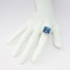 Picture of 14k Yellow Gold & Emerald Cut Blue Topaz Ring with a Sky Blue Enamel Halo