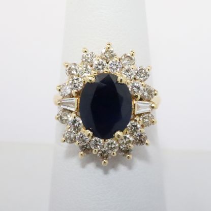 Picture of 14k Yellow Gold & Oval Cut Blue Sapphire Ring with Double Diamond Halo
