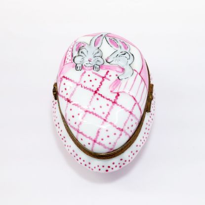 Picture of Retired Limoges Porcelain Rabbits Sleeping in Pink Egg Shaped Bed Trinket Box