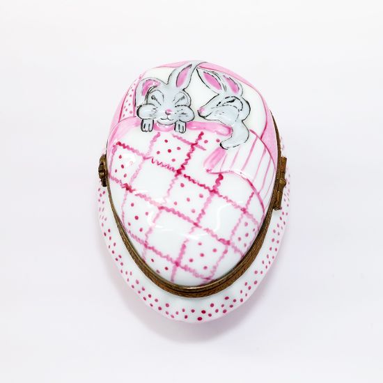 Picture of Retired Limoges Porcelain Rabbits Sleeping in Pink Egg Shaped Bed Trinket Box
