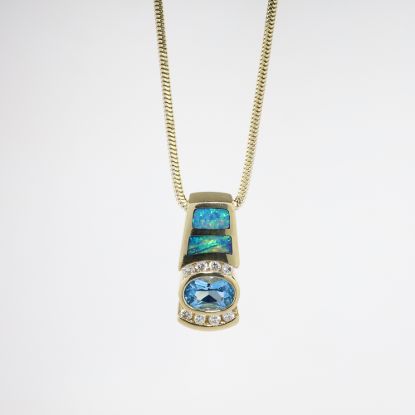 Picture of 14k Yellow Gold Necklace with Oval Cut Blue Topaz, Opal & Diamond Pendant