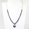 Picture of 21k Yellow Gold & Blue Sapphire Necklace with Leaf & Berry Pendant