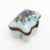Picture of Vintage Traditional Casket Style Limoges Trinket Box With Flower, Ribbon & Insect Motif.