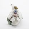 Picture of Lladro Porcelain 'Swan Song' Girl Riding Swan Figurine #5704 with Original Box