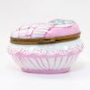 Picture of Retired Limoges Porcelain Rabbits Sleeping in Pink Egg Shaped Bed Trinket Box