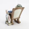 Picture of Lladro #5846 'All Tuckered Out' Boy Sleeping in Rocking Chair with Toy Horse Porcelain Figurine