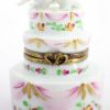 Picture of Limoges Porcelain Wedding Cake Trinket Box with Dove Cake Toppers & Surprise Rings Inside