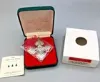 Picture of Reed & Barton Sterling Silver 1995 Annual Christmas Cross Ornament, with box