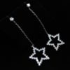 Picture of Clear Cz Small Star Dangle Post Back Earrings. 2.5" Long, .75" Wide