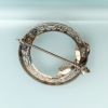 Picture of Art Deco Era 14K White Gold Filigree, Diamond & Sapphire Wreath & Bow Brooch