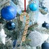 Picture of 2021 Gold Plated and Enameled Candy Cane Ornament 41st Edition