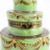 Picture of Limoges Porcelain Chocolate Wedding Cake with Green Icing & Bride & Groom Topper Trinket Box  