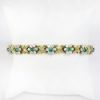 Picture of 18k Two Tone Gold Diamond and Emerald Bracelet