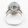 Picture of 18k White Gold Oval Aquamarine & Brilliant Diamond Halo Ring