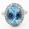 Picture of 18k White Gold Oval Aquamarine & Brilliant Diamond Halo Ring