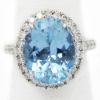 Picture of 18k White Gold Oval Aquamarine & Brilliant Diamond Halo Ring