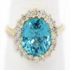 Picture of 14k Yellow Gold Oval Zircon & Diamond Halo Ring